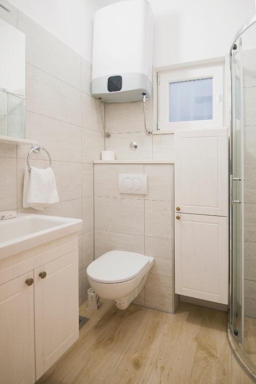 Koupelna v ubytování Apartmani Tomica