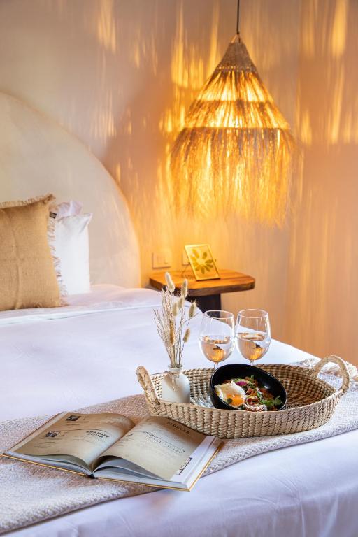 Postel nebo postele na pokoji v ubytování HOLT Hotel del Pueblito
