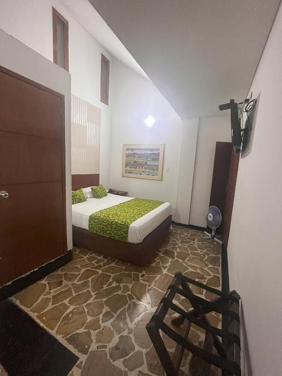 Postel nebo postele na pokoji v ubytování Hotel Zandu
