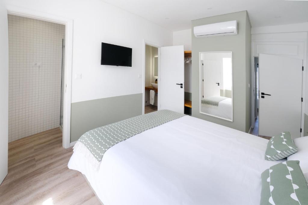 Postel nebo postele na pokoji v ubytování Boa Nova Hostel