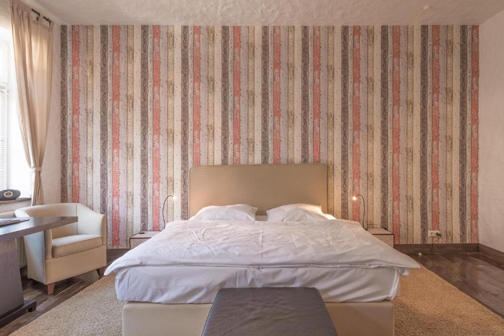 Giường trong phòng chung tại Lodge am Oxenweg - Zimmer 1