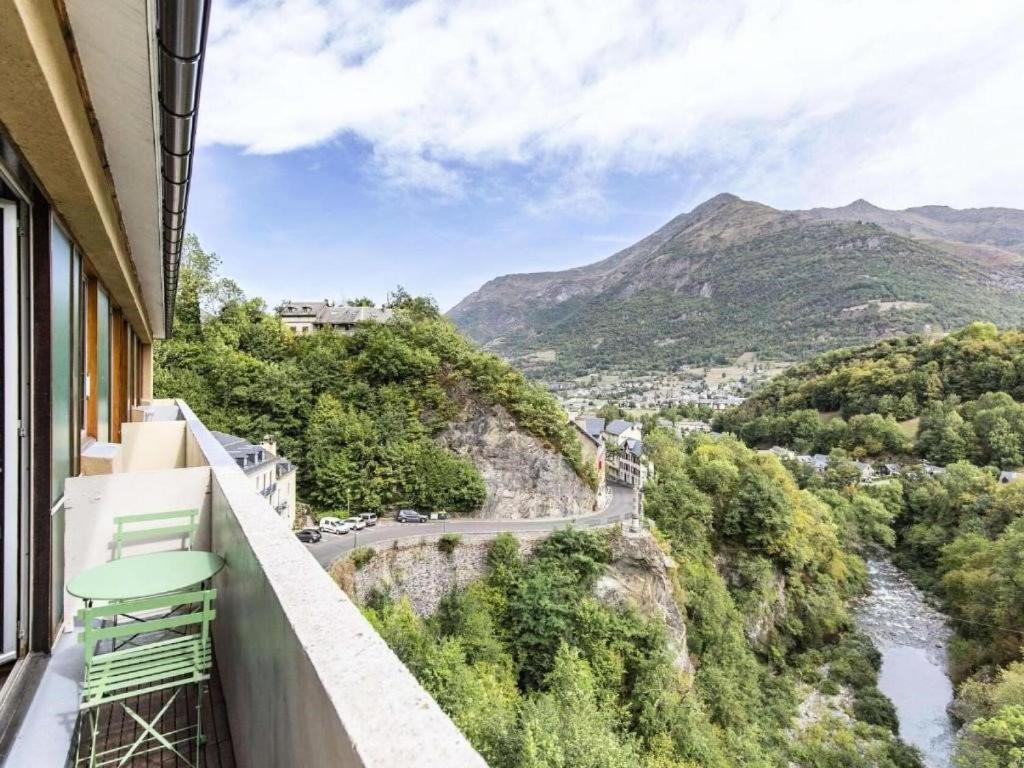a balcony with a view of a river and mountains at Résidence Princes - Studio pour 6 Personnes 434 in Sassis