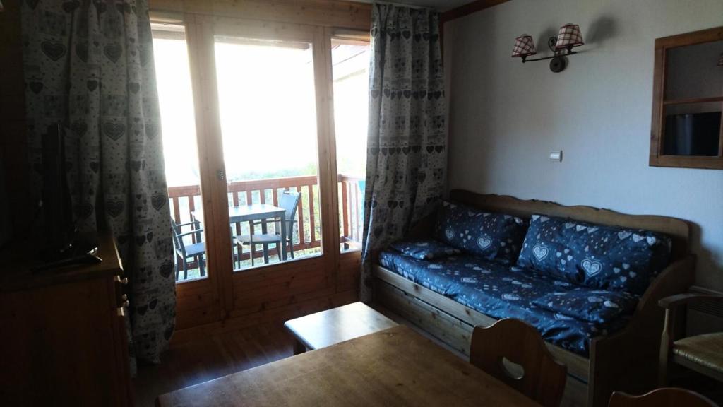 Prostor za sedenje u objektu Edelweiss Chalets De La Vallee D'or - 2 Pièces pour 4 Personnes 34