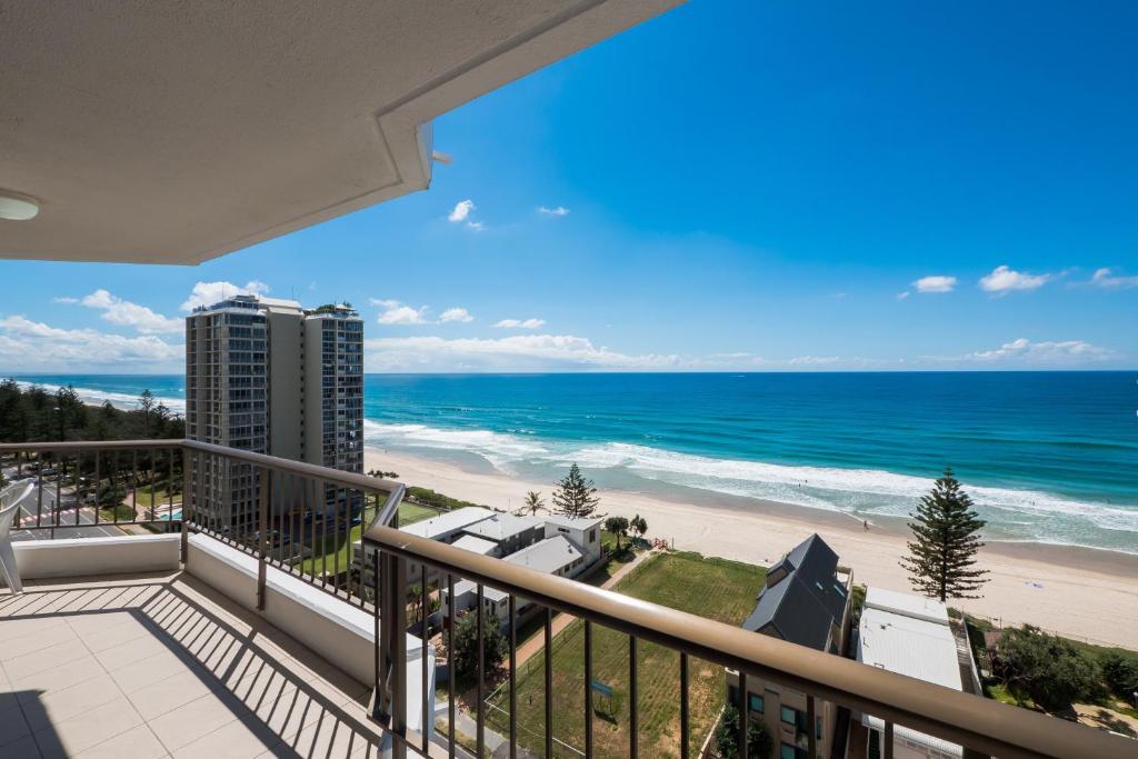 a view from a balcony of a beach with a view of the ocean at Carrington Court in Gold Coast