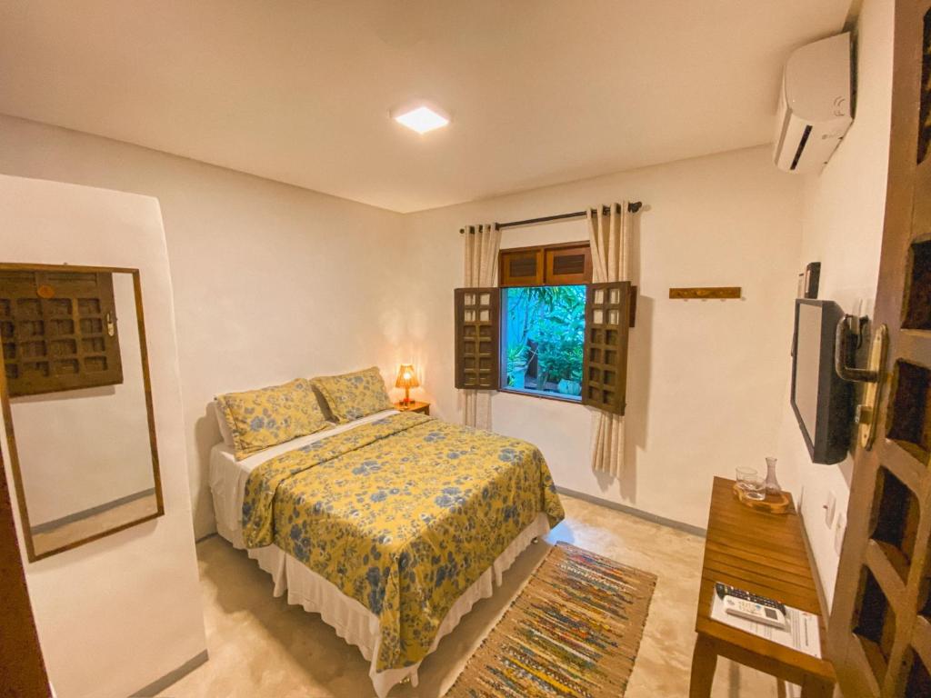 Postel nebo postele na pokoji v ubytování Maruê Guesthouse Porto de Pedras