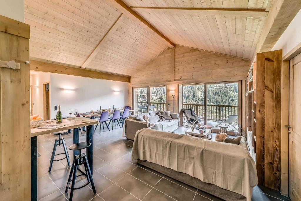 Restoran või mõni muu söögikoht majutusasutuses Résidence Les Nouveaux Alpages - Appartement 4 avec accès au SPA MAE-6664