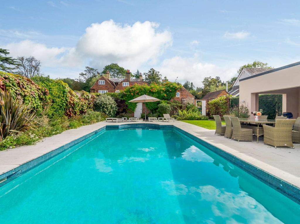 a swimming pool in the backyard of a home at 2 Bed in Goudhurst 51229 in Goudhurst