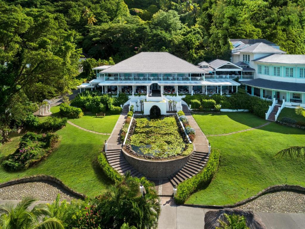 an aerial view of a house with a garden at Sugar Beach, A Viceroy Resort in Soufrière