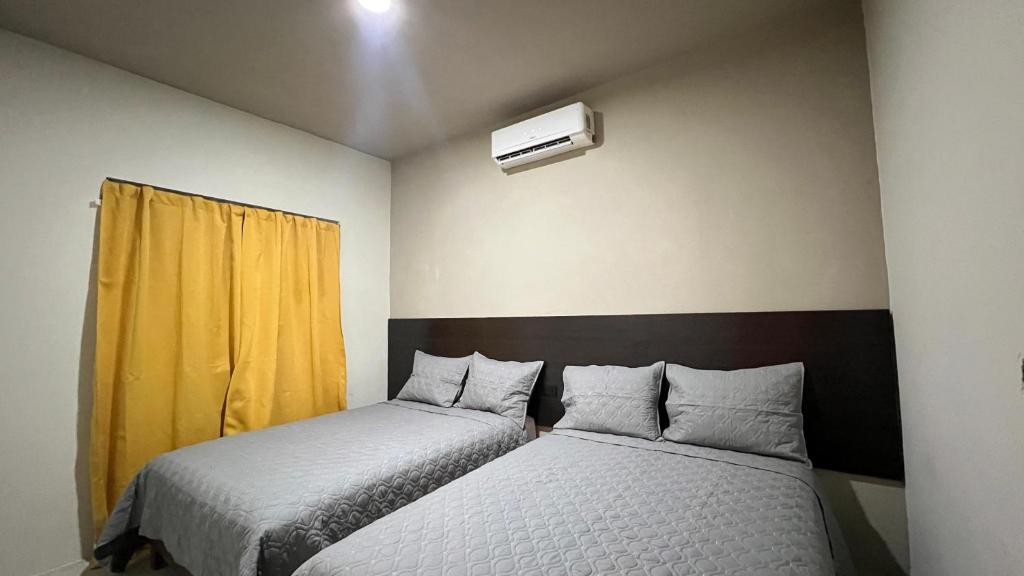 Postel nebo postele na pokoji v ubytování Hotelito s