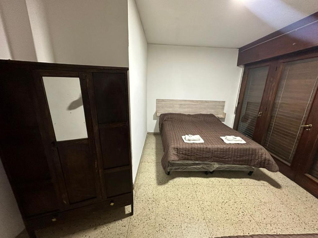 Postel nebo postele na pokoji v ubytování Hostel Vicente