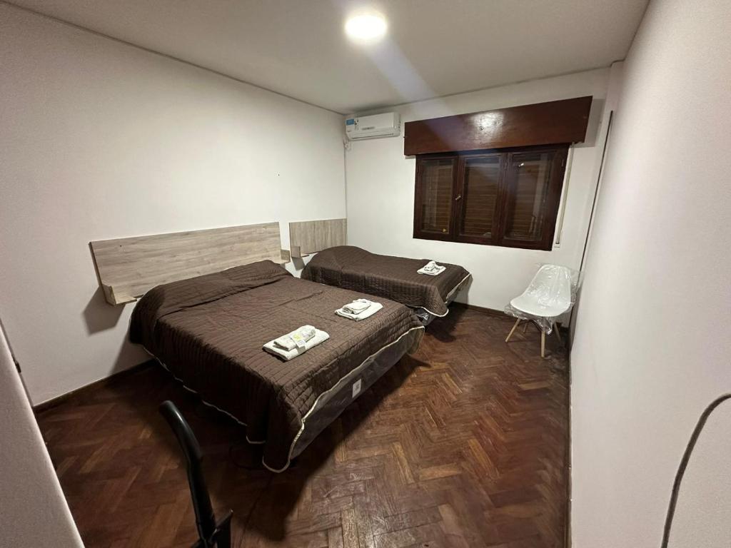 Postel nebo postele na pokoji v ubytování Hostel Vicente