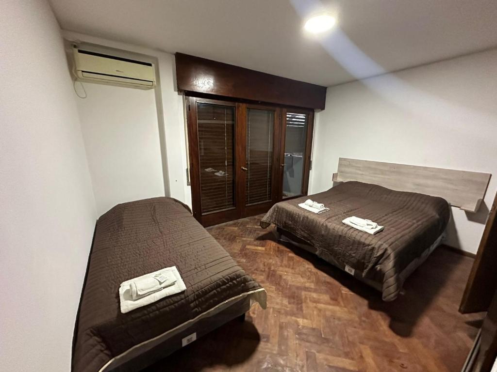 Postel nebo postele na pokoji v ubytování Hostel Vicente