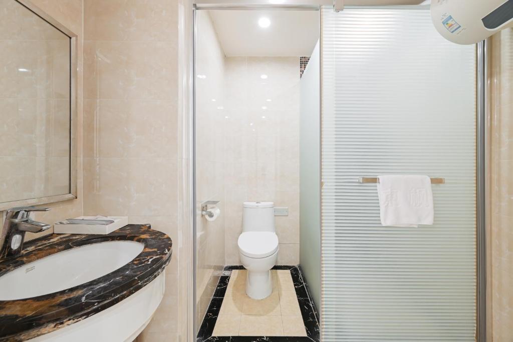 Koupelna v ubytování East Maple International Apartment - Guangzhou Luogang Wanda Plaza Suyuan Metro Station