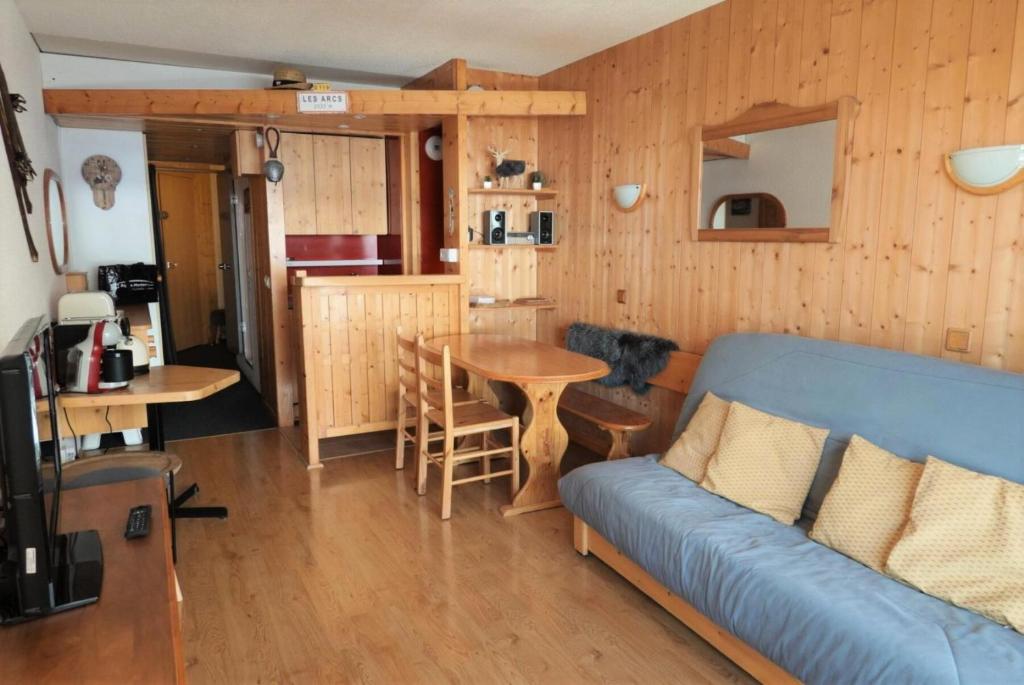O bucătărie sau chicinetă la Residence Hotel Aiguille Rouge - Studio pour 4 personnes à Arc 2000 ski aux pieds, au centre de la station, près des commerces, du bowling et de la patinoire MAE-7104