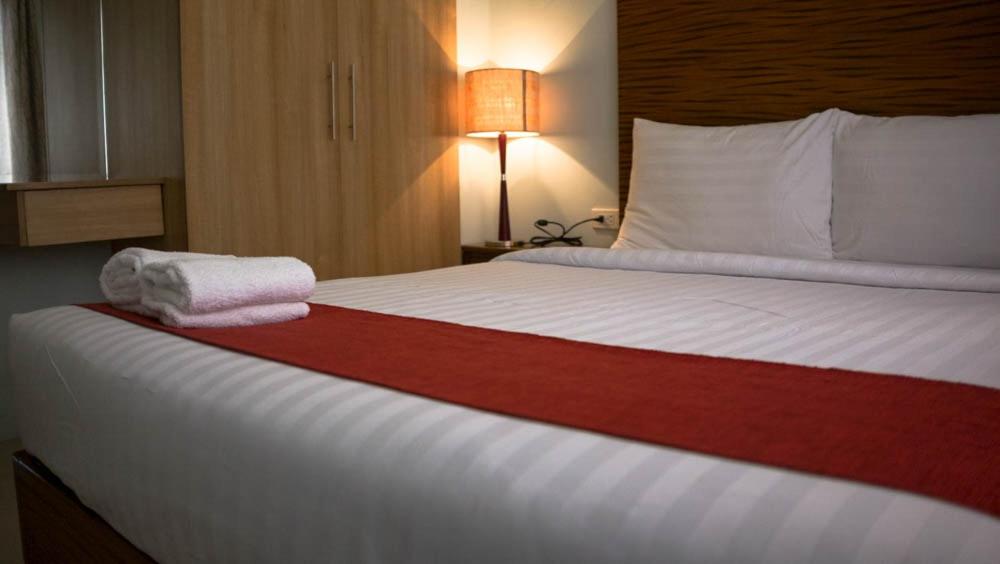 Postel nebo postele na pokoji v ubytování Sebastien Hotel