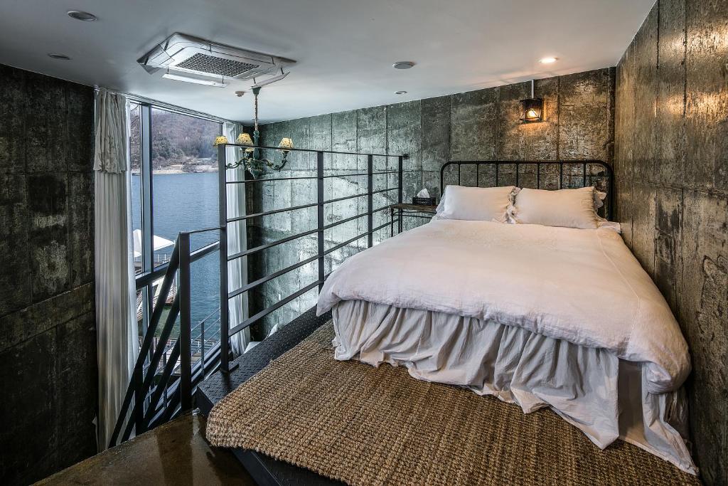 Postel nebo postele na pokoji v ubytování SS Resort