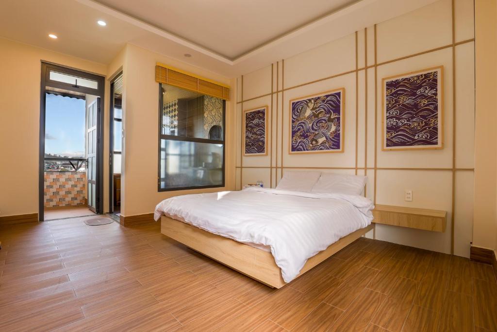Giường trong phòng chung tại AN PHÚ Home