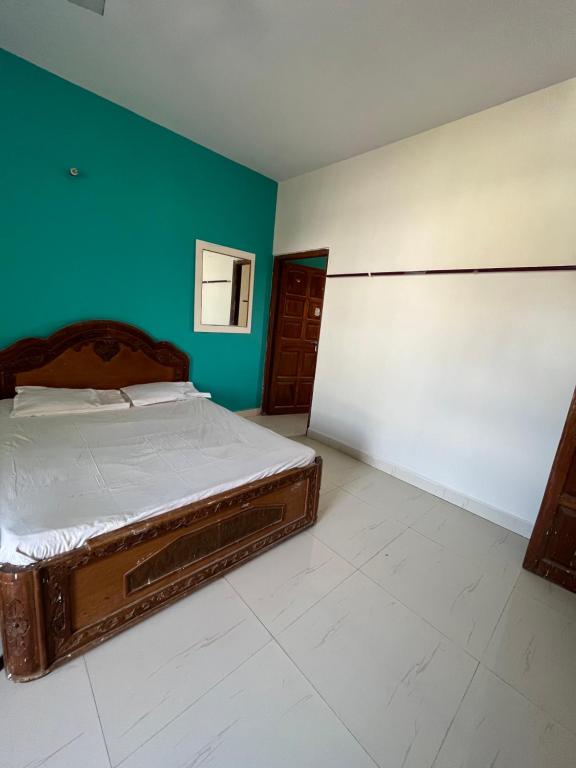 Postel nebo postele na pokoji v ubytování Hotel Raghunath Residency Niwas