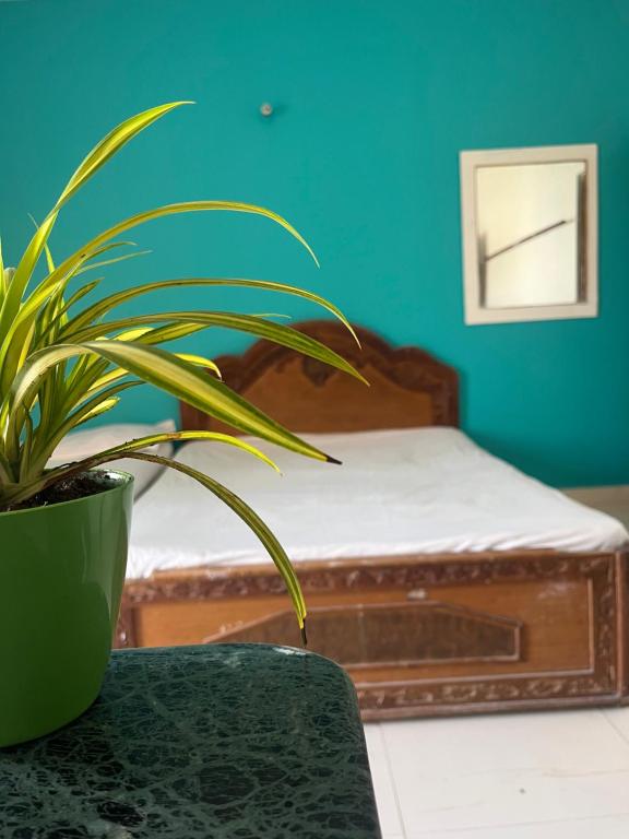 Postel nebo postele na pokoji v ubytování Hotel Raghunath Residency Niwas