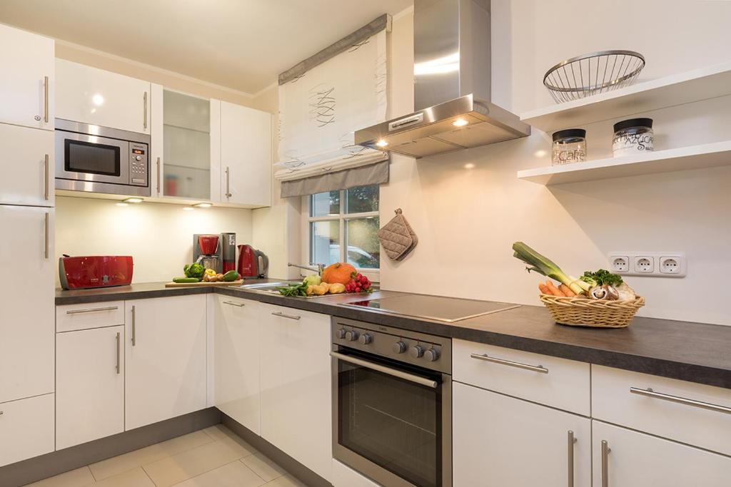 Kuchyň nebo kuchyňský kout v ubytování Haus ZingstZeit
