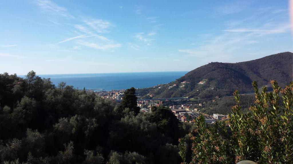 a view of the ocean from a mountain at Tigullio Vacations in Leivi