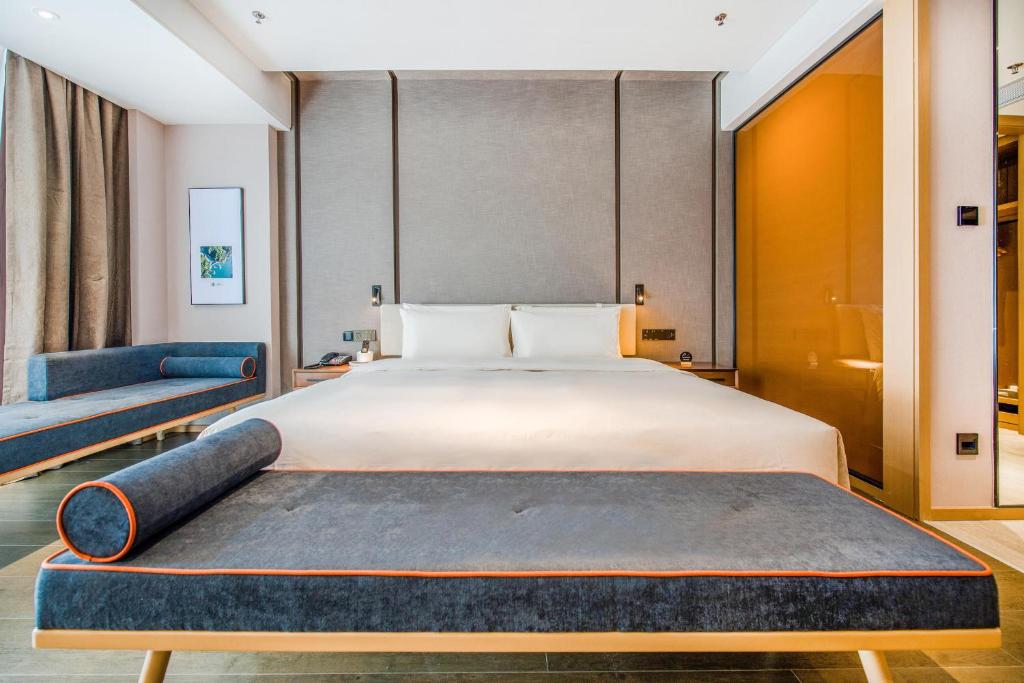 Postel nebo postele na pokoji v ubytování Atour Hotel Zhongshan Tanzhou