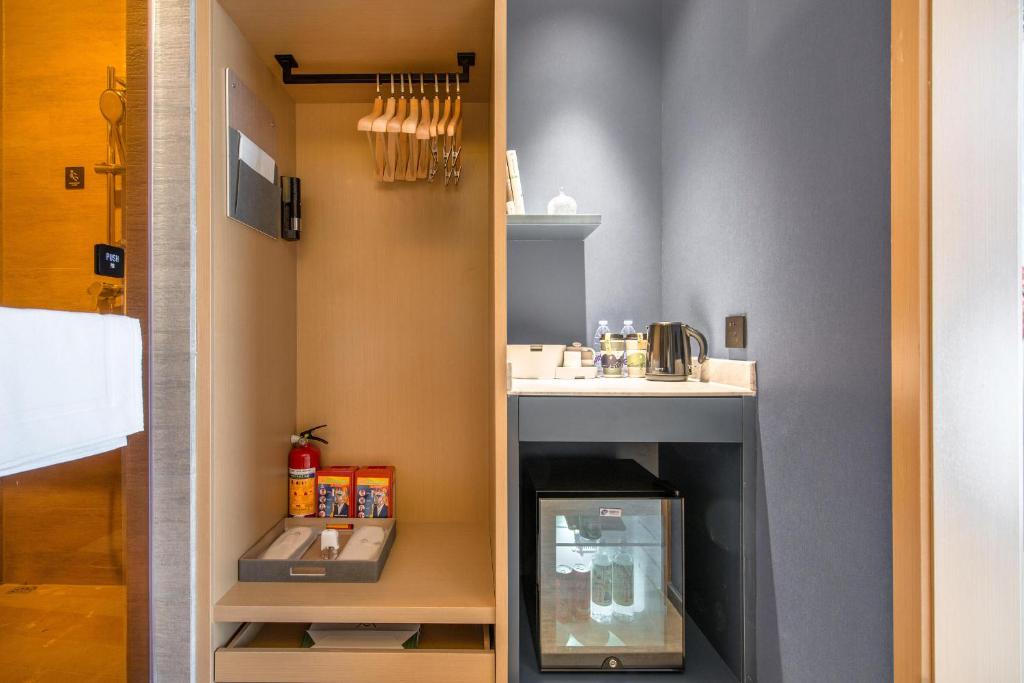 Kuchyň nebo kuchyňský kout v ubytování Atour Hotel Zhongshan Tanzhou