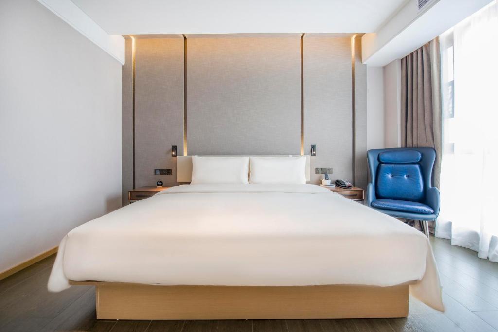 Postel nebo postele na pokoji v ubytování Atour Hotel Zhongshan Tanzhou