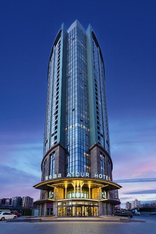 a tall building with a sign on it at Atour Hotel Beijing Lishuiqiao in Changping