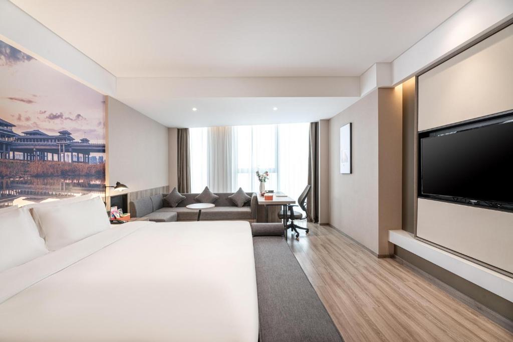 TV a/nebo společenská místnost v ubytování Atour Hotel Xi'an Daming Palace