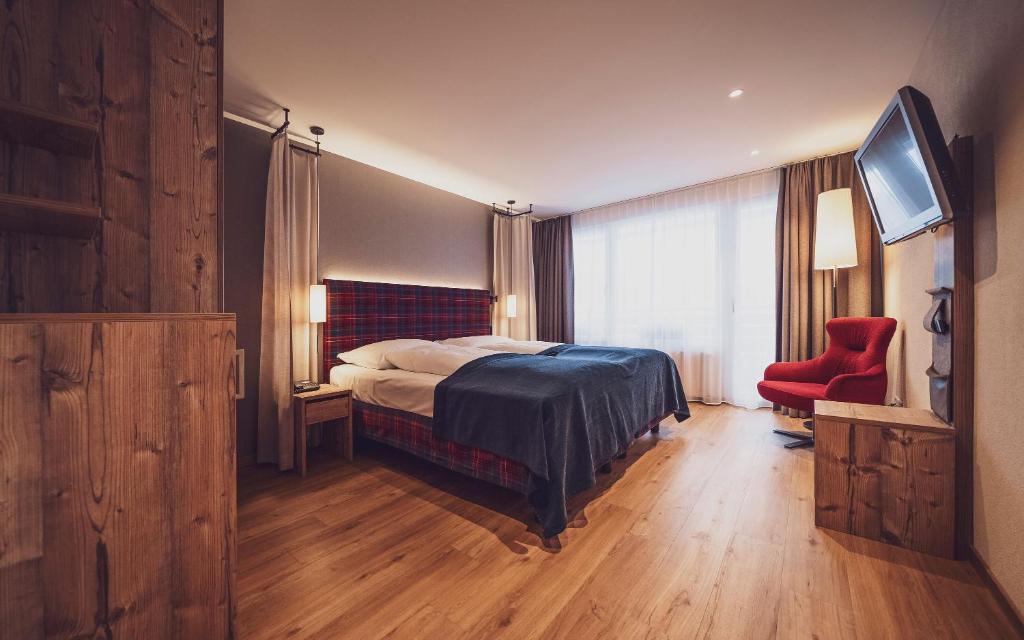 Postel nebo postele na pokoji v ubytování Mountain Plaza Hotel