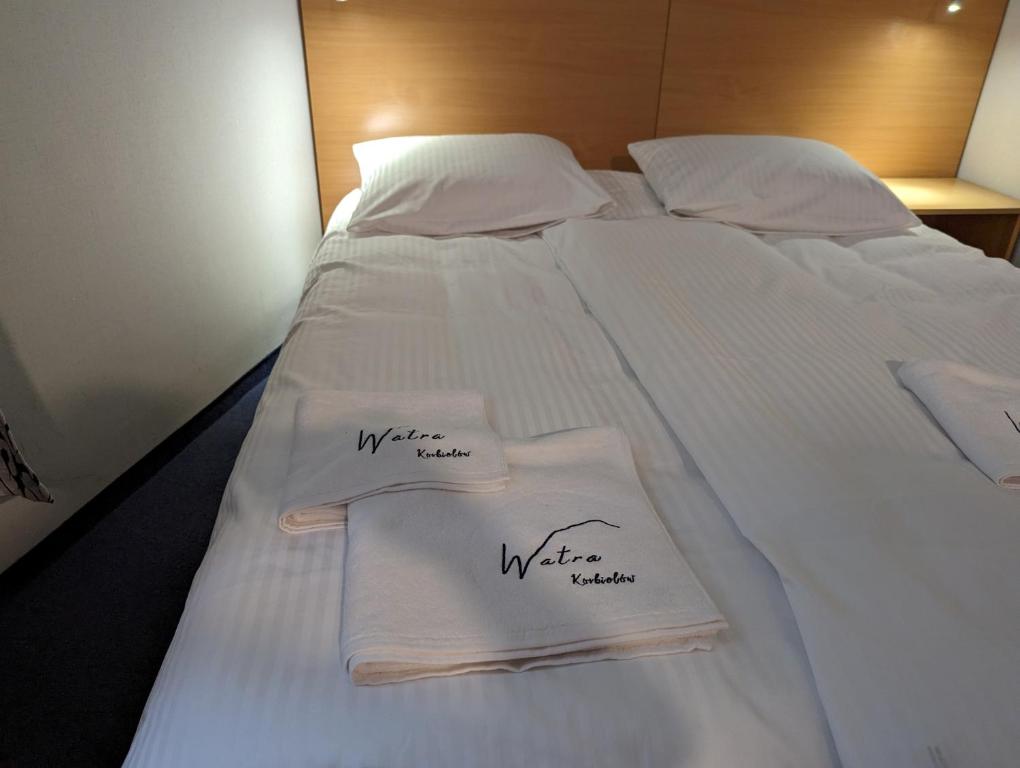 Postel nebo postele na pokoji v ubytování Ośrodek Wypoczynkowy Watra