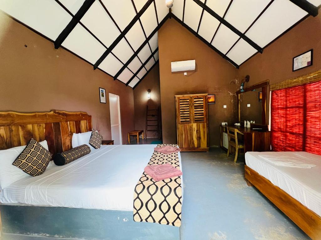Coco Village Hotel Chilaw - Habitación Triple Con Vista Al Jardín