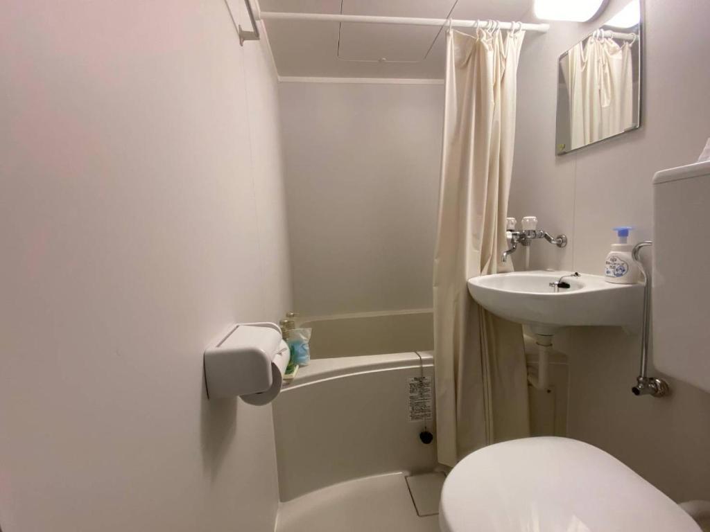Koupelna v ubytování ラグナイン 八王子 Laguna inn