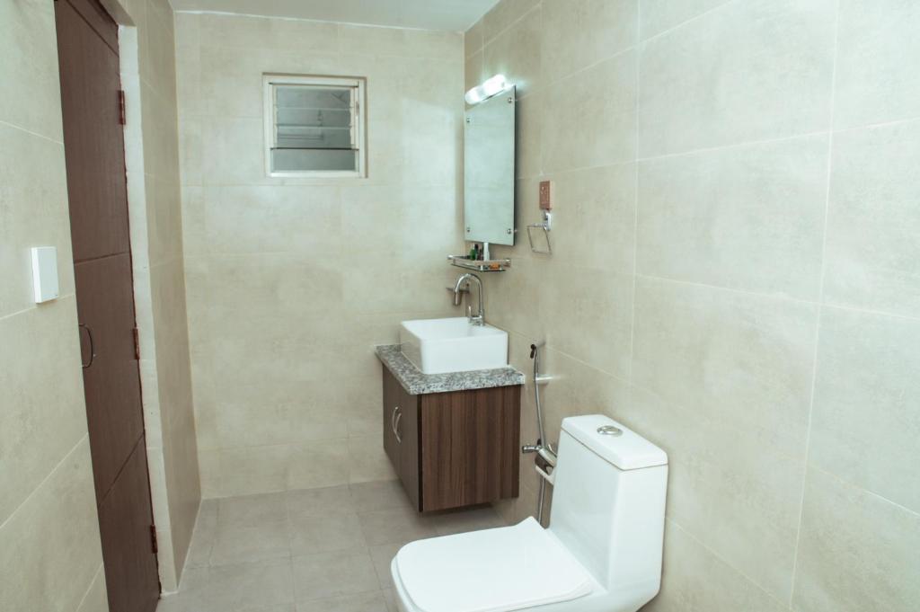 Koupelna v ubytování Kusum Airport Hotel