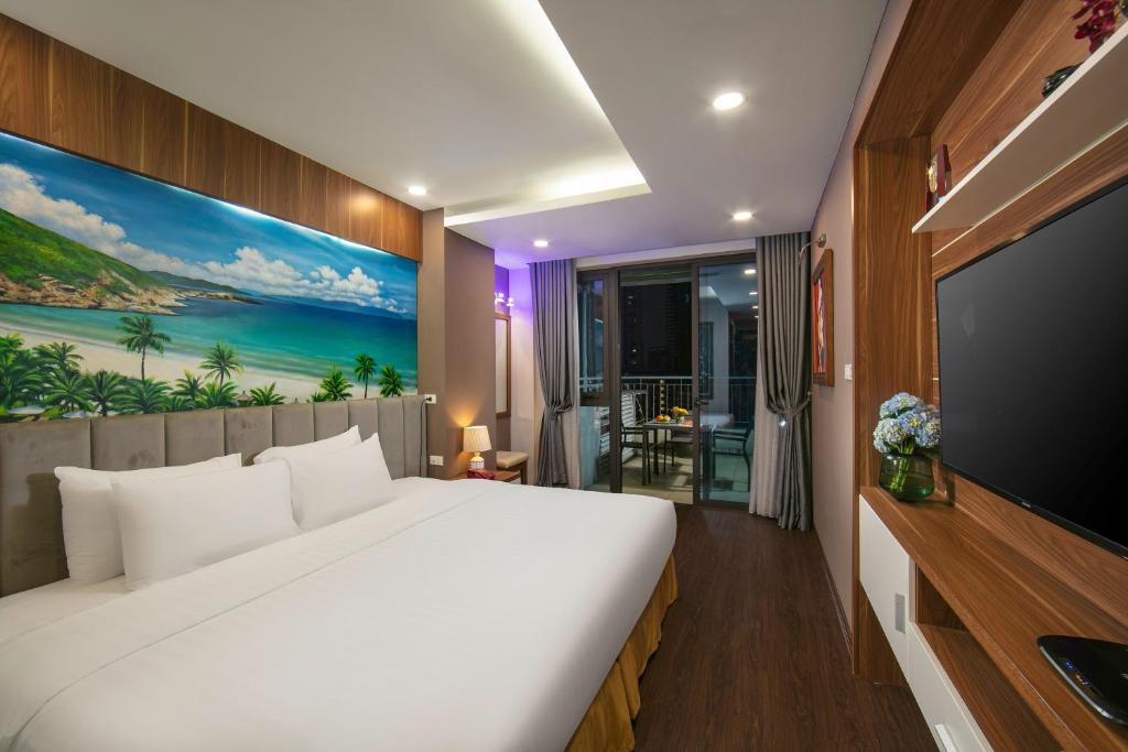 TV a/nebo společenská místnost v ubytování Brilliant Me Tri Hotel & Spa