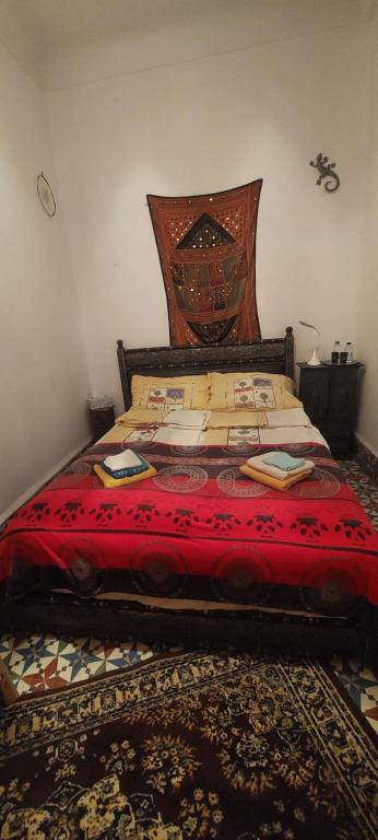 Postel nebo postele na pokoji v ubytování Riad Kainos