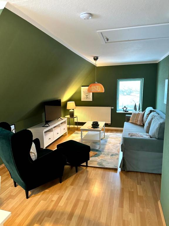 Posezení v ubytování Ferienhaus am Saaler Bodden