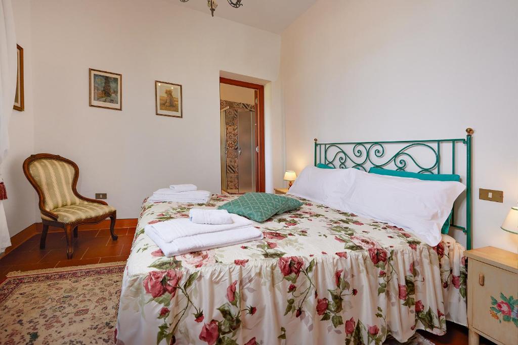 Postel nebo postele na pokoji v ubytování Tenuta il Poggetto