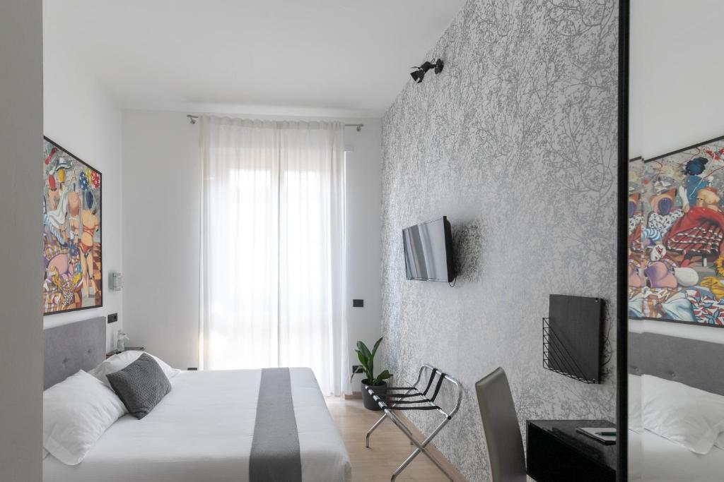 TV a/nebo společenská místnost v ubytování Aiello Rooms