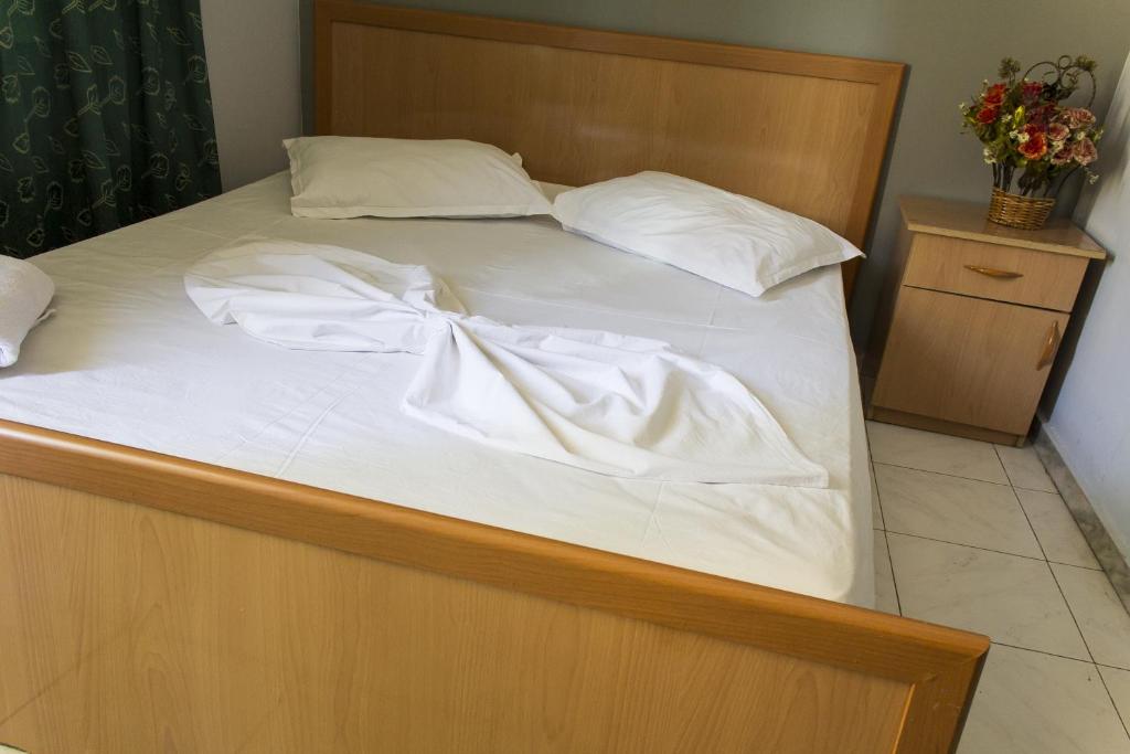 Postel nebo postele na pokoji v ubytování Hotel Central