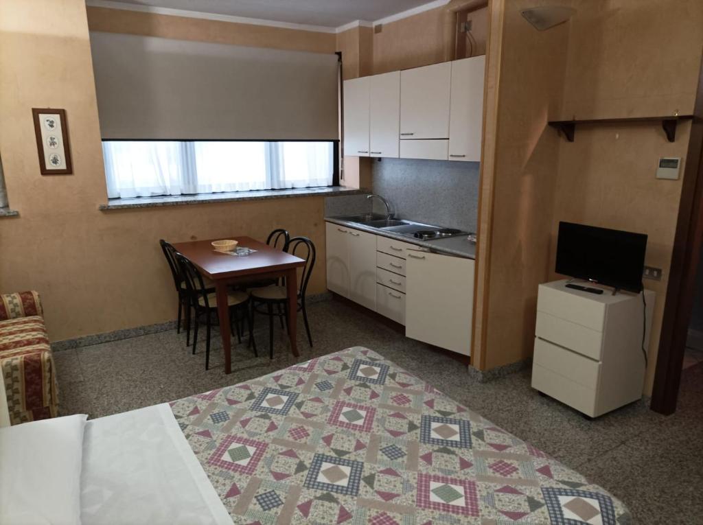 Kuchyň nebo kuchyňský kout v ubytování Residence Le Arcate