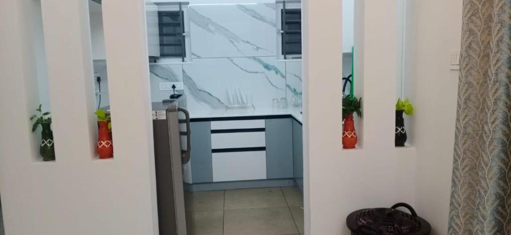 Kuchyň nebo kuchyňský kout v ubytování Azure Home Stay