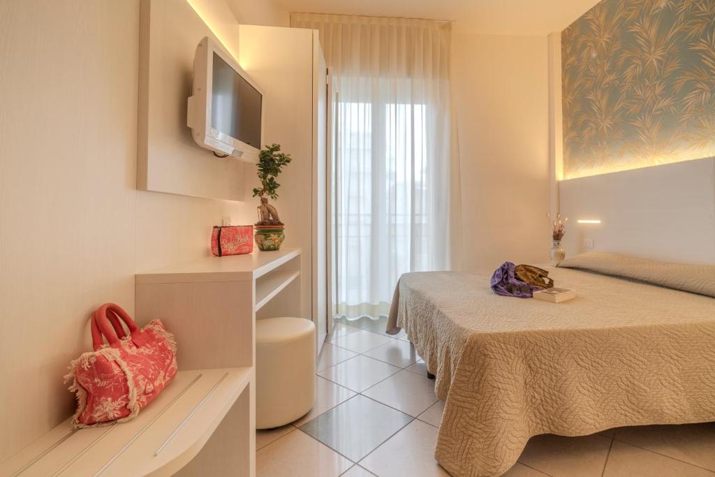 Posteľ alebo postele v izbe v ubytovaní Hotel Faber