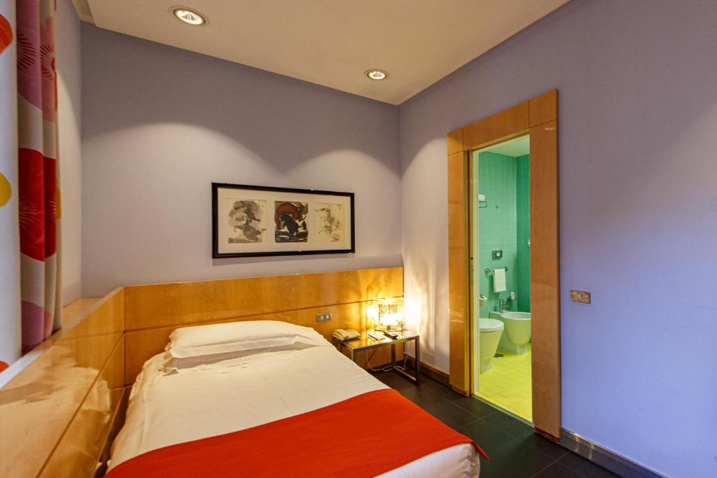 Postel nebo postele na pokoji v ubytování Albani Hotel Roma