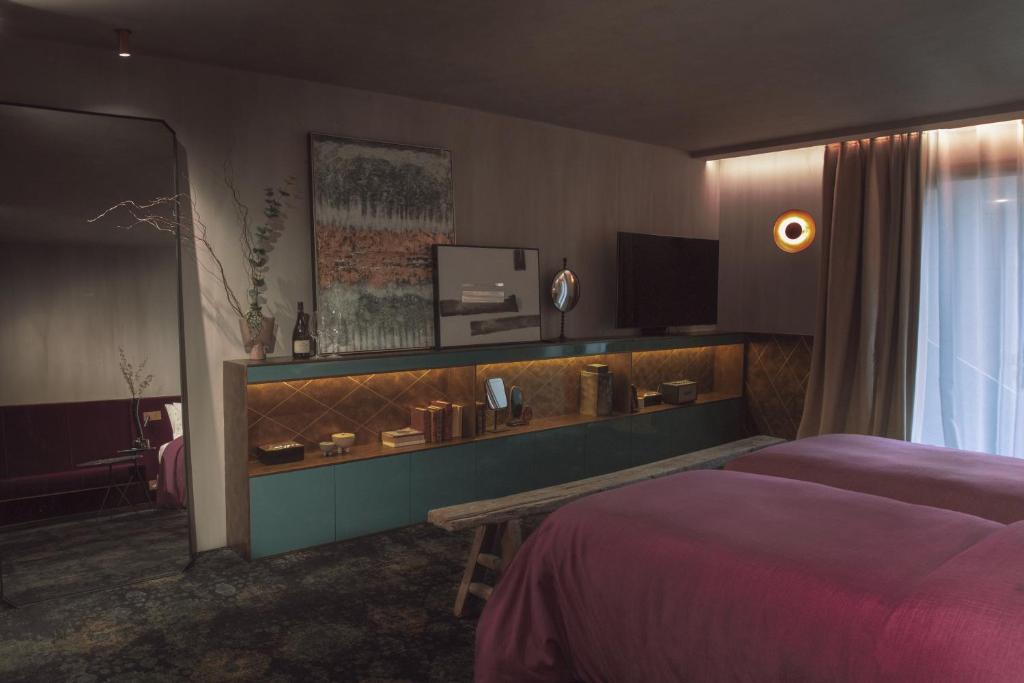 Postel nebo postele na pokoji v ubytování Unique Boutique Hotel Antibes Juan-les-Pins