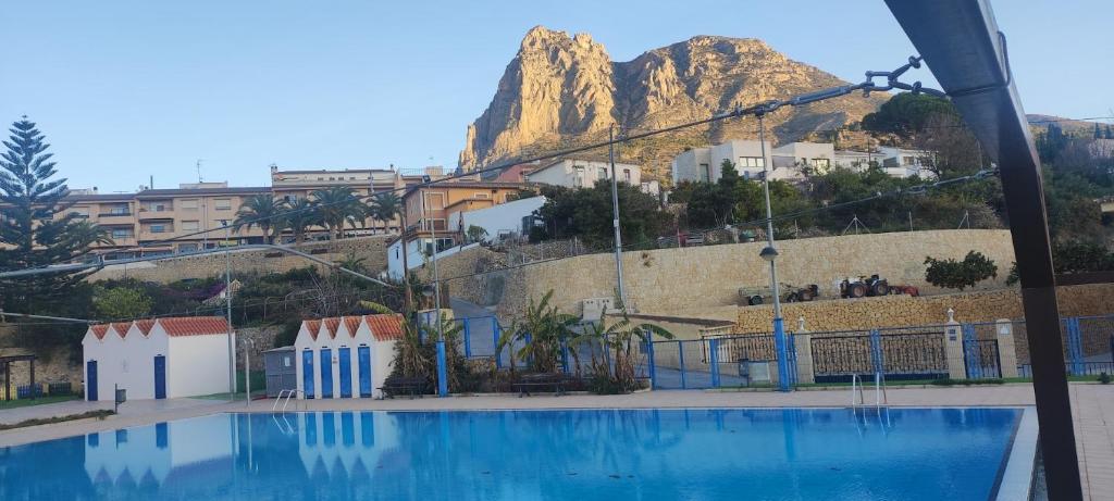 a view of a mountain from a swimming pool at Casa Pp in Finestrat