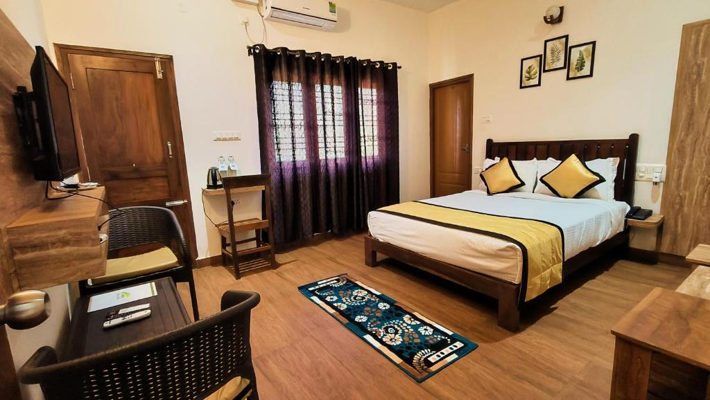 Postel nebo postele na pokoji v ubytování Hill Crest Resort - Coorg