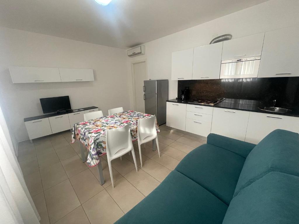 Kuchyň nebo kuchyňský kout v ubytování Villa Marina Apartments - Agenzia Cocal