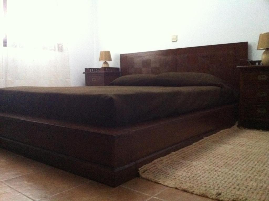 Cama o camas de una habitación en Alojamientos Botica Rural
